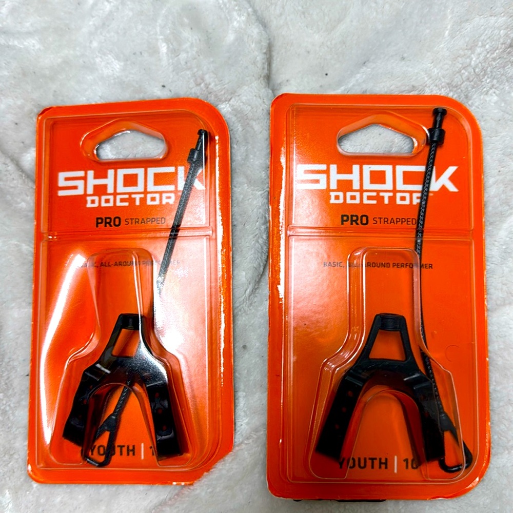 Brand new 2 set of shock doctor pro strapped